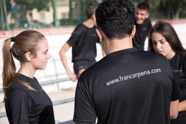 Entrenador atletismo, trabajo en equipo