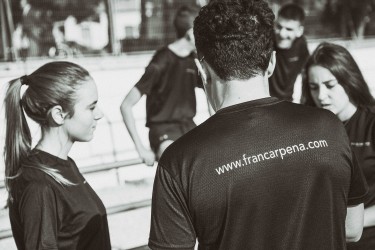 Entrenador atletismo, trabajo en equipo
